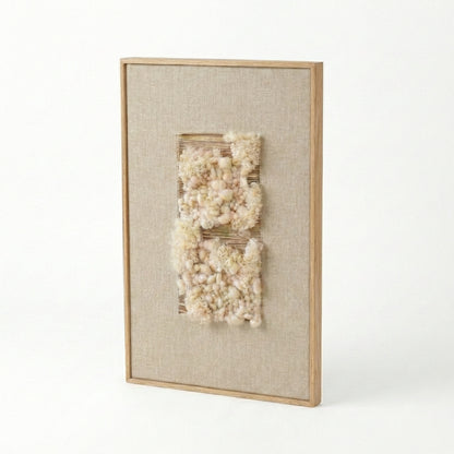 Framed textured wall art on a white background